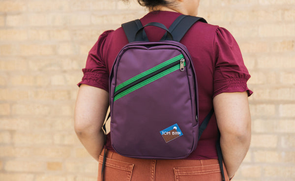 A person wearing the Zeitgeist on their back.